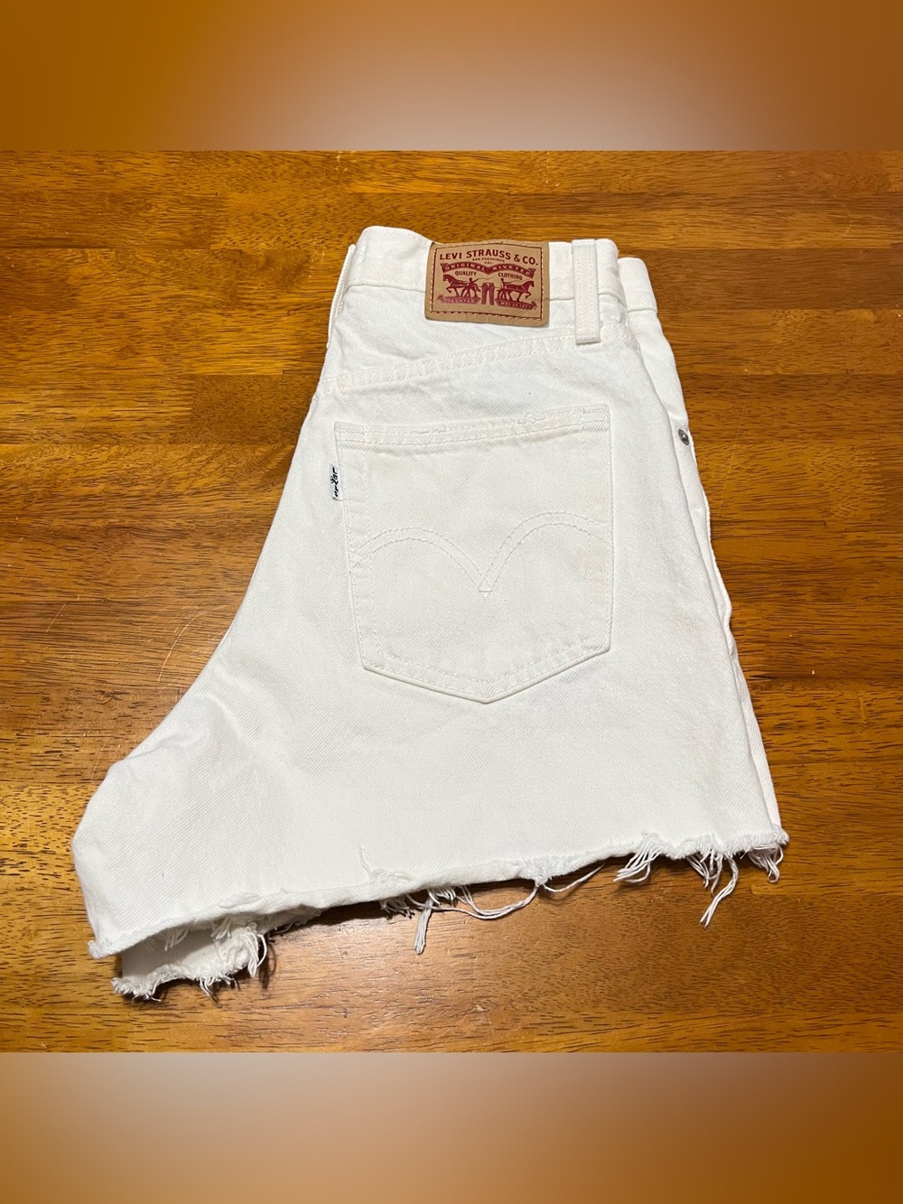 Levi’s High-Waisted White Distressed Denim Cutoff Shorts size 26
